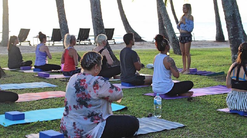 Beach Yoga Classes in Tropical Paradise - Palm Cove, Cairns. A Unique Chance to Unwind and Loosen tensions from the Body, Mind and Soul in a World Class setting.